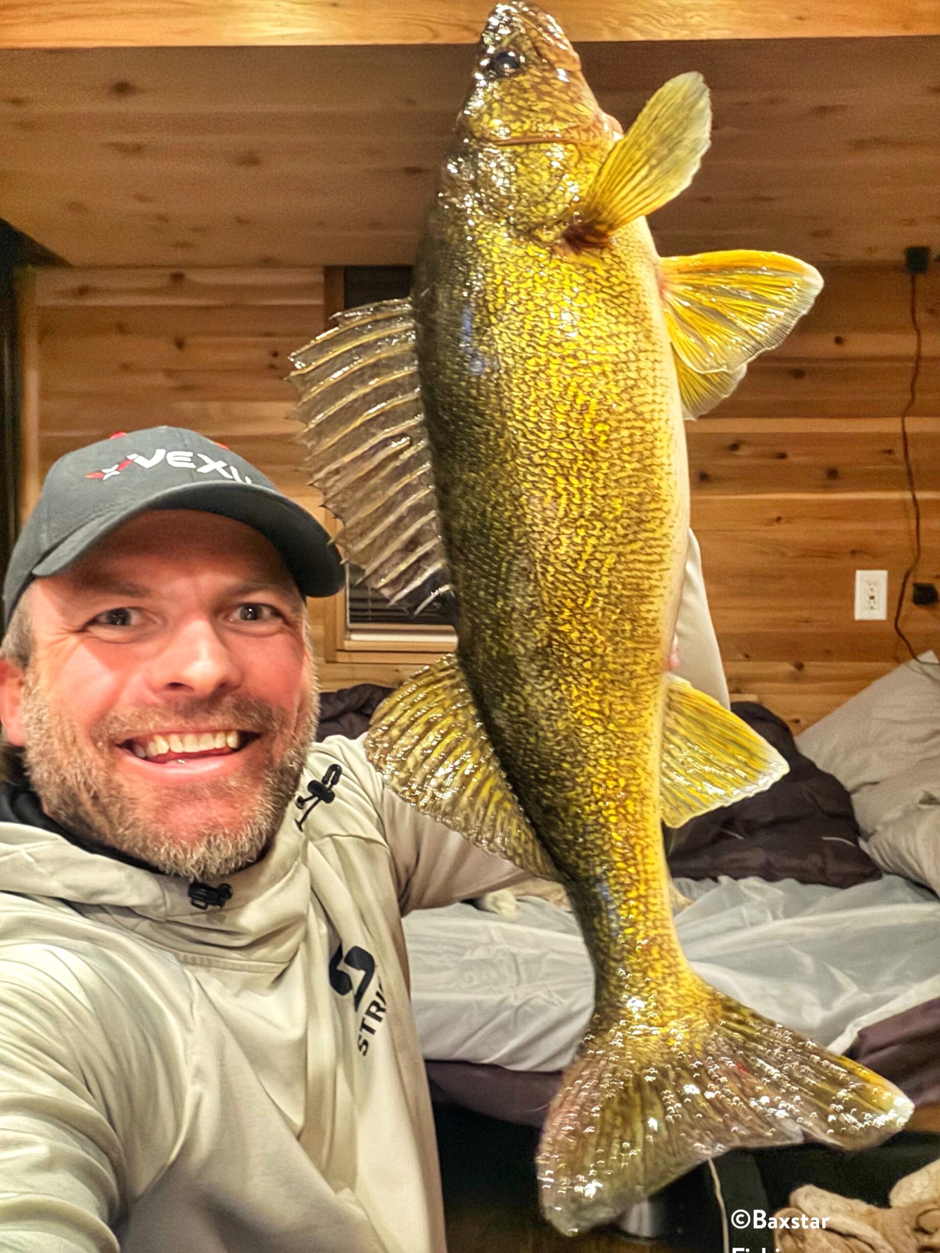 man holding a nice walleye