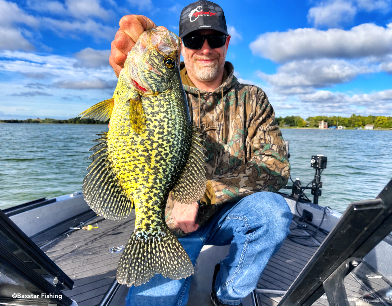 man holds a nice crappie fishing on Detroit Lake